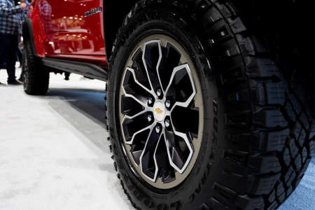 SEATTLE, WA - NOVEMBER 12, 2017: The 2018 Chevrolet Colorado, a mid-size pickup truck performed at Seattle International Auto Show. Car detail, a wheel with the Chevrolet logotype.のeditorial素材