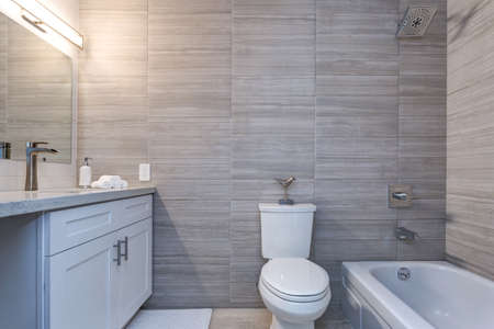 Grey interior of a modern bathroom in apartment.の写真素材