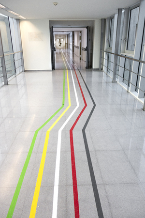 Orientation lines in a buildingの写真素材