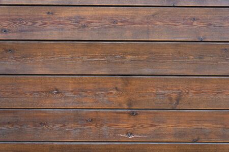 Brown wooden slats with texture worn by the passage of time