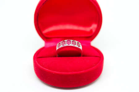 Ruby ring in red jewel box on white background.の写真素材