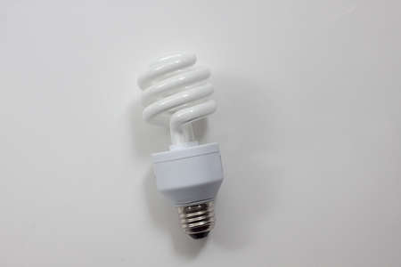 compact fluorescent bulb against white background