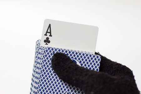 ace pop out of deck against white