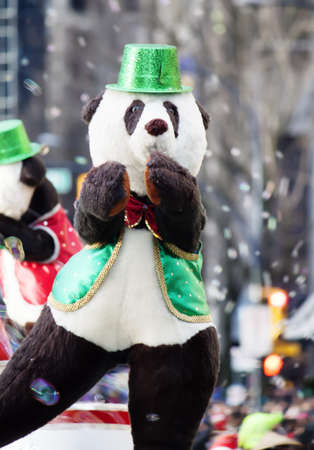 dancing bear at christmas paradeの写真素材