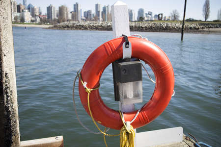 a life preserver hanging by the dock