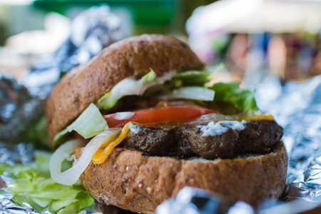 a burger hot off grillの写真素材