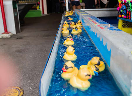 a duck game at carnivalの写真素材