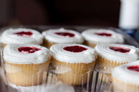 tray of strawberry drop cupcakesの写真素材