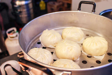 Steam buns at night marketの写真素材