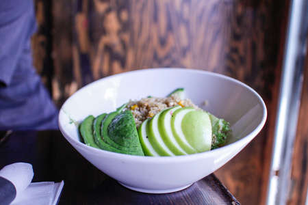An elegant quinoa apple and avocado saladの写真素材