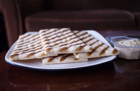 middle eastern flatbread on white plateの写真素材