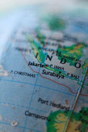 a macro shot on Indonesia island on globe