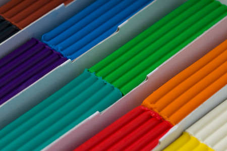 Set of colorful plasticine sticks. Close up. Background