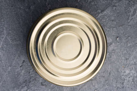 Tin can on concrete background. top view. Tin Circle shape on bottom of tin can