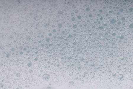 Foam bubble from soap or shampoo washing on top view