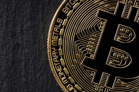 Gold Coin Bitcoin On Dark Background. Close up. Cryptocurrency.の写真素材