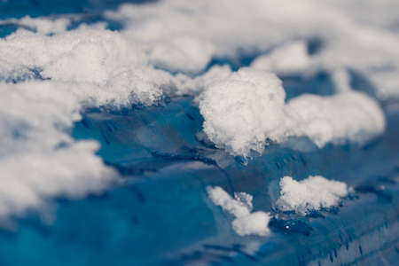 Blue roof covered with snow in winter season.の写真素材