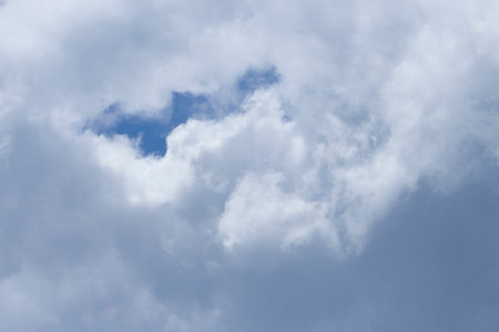 a blue sky with clouds for backgroundの写真素材