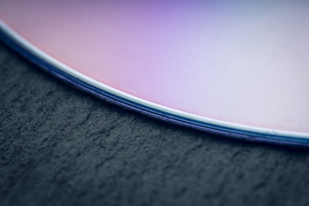 Abstract purple CD background. Macro shotの写真素材