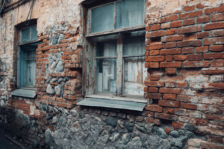 Old vintage windows on brick wall
