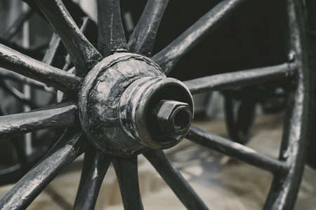 Close up view of wheel of vintage wooden cartの写真素材