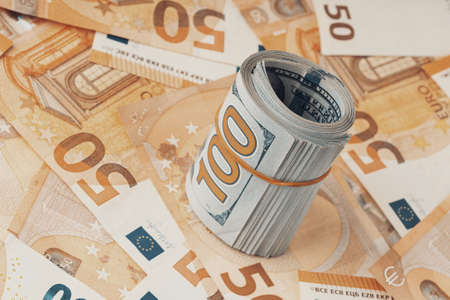 Lot of dollars and euros. background texture. Cash and currency conceptの写真素材
