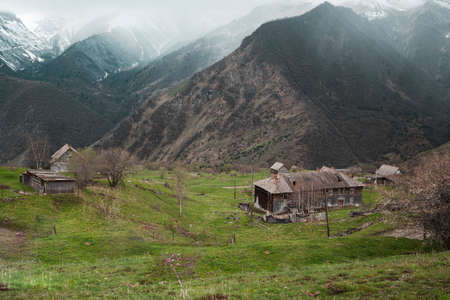 Abandoned old wooden house in the mountain. North Ossetia-Alania , Verhny Zgid , Russiaの写真素材