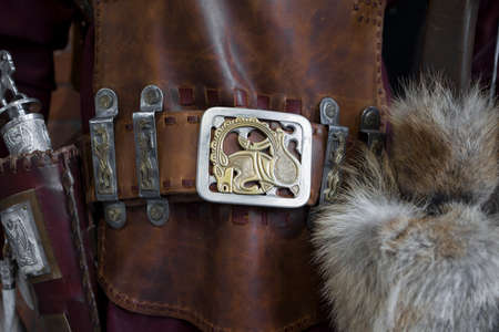 Close up view of Scythian leather belt on armor