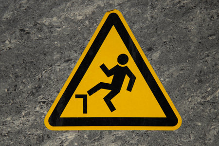 watch your step sign, close up view