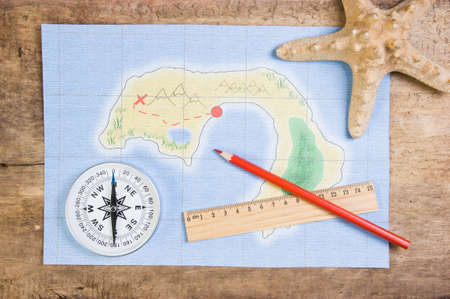 Still life with things leisure and travel on a background of mapの写真素材