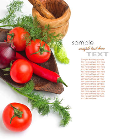 tomato and dill on a plate and white background の写真素材