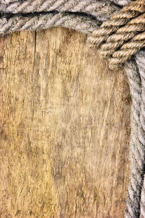 frame made of rope on the old boardの写真素材