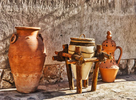 Eastern pitchers stand on a shelf in an Arab shopの写真素材