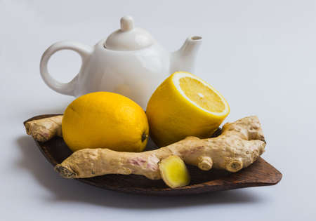 Ginger and lemon isolated on white backgroundの写真素材