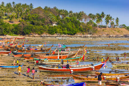 Fishing boats on the sea shore in Phuket, Thailandのeditorial素材