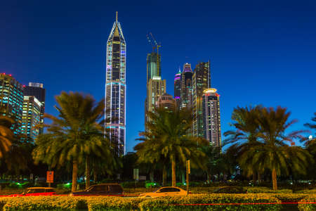 DUBAI, UAE - NOVEMBER 11: High rise buildings and streets nov 11. 2013  in Dubai, UAE. Dubai was the fastest developing city in the world between 2002 and 2008.のeditorial素材