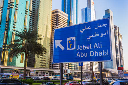 DUBAI, UAE - NOVEMBER 9: Modern skyscrapers, Sheikh zayed roads on November 9, 2013 in Dubai, United Arab Emirates. Dubai is the fastest growing city in the world.のeditorial素材