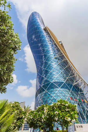 ABU DHABI, UAE - NOVEMBER 5: The Capital Gate Tower on the November 5, 2013 in Abu Dhabi, This is certified as the World's Furthest Leaning Manmade in the world. it is in the heart of the business area.のeditorial素材