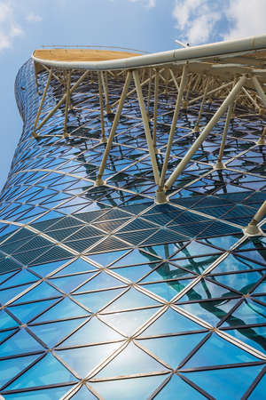 ABU DHABI, UAE - NOVEMBER 5: The Capital Gate Tower on the November 5, 2013 in Abu Dhabi, This is certified as the World's Furthest Leaning Manmade in the world. it is in the heart of the business area.のeditorial素材