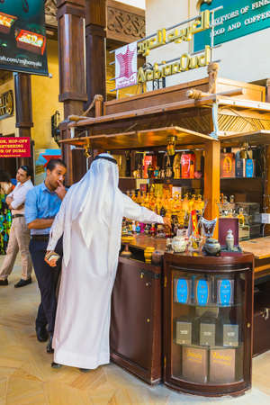 DUBAI - NOVEMBER 7: The famous hotel and tourist district of Madinat Jumeirah NOVEMBER 7, 2013 in Dubai. Built with ancient style, has many shops, restaurants and viewing platforms on Burzh al Arabのeditorial素材
