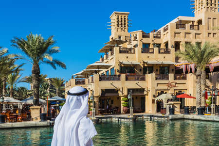 DUBAI - NOVEMBER 7: The famous hotel and tourist district of Madinat Jumeirah NOVEMBER 7, 2013 in Dubai. Built with ancient style, has many shops, restaurants and viewing platforms on Burzh al Arabのeditorial素材