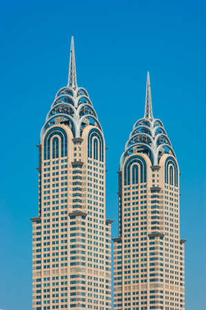 DUBAI, UAE - NOVEMBER 12: High rise buildings and streets nov 12. 2012 in Dubai, UAE. Copies of the...