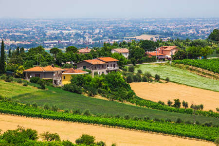 rural landscape with houses standing alone in the province of Tuscany in Italyのeditorial素材