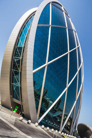 ABU DHABI, UAE - NOVEMBER 5: The Aldar headquarters building is the first circular building of its kind in the Middle East on November 5, 2013 in Abu Dhabi, UAEのeditorial素材