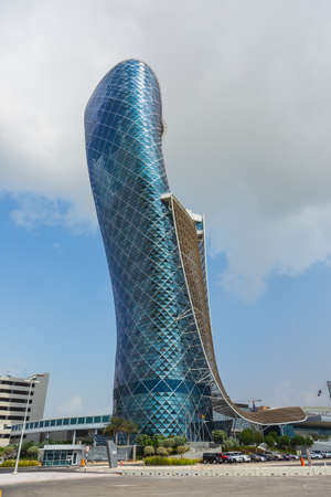 ABU DHABI, UAE - NOVEMBER 5: The Capital Gate Tower on the November 5, 2013 in Abu Dhabi, This is certified as the World's Furthest Leaning Manmade in the world. it is in the heart of the business area.のeditorial素材