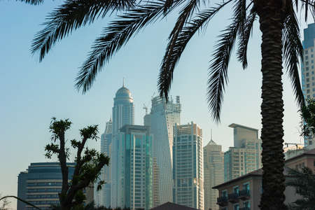 DUBAI, UAE - NOVEMBER 13: High rise buildings and streets nov 13. 2012  in Dubai, UAE. Dubai was the fastest developing city in the world between 2002 and 2008.のeditorial素材