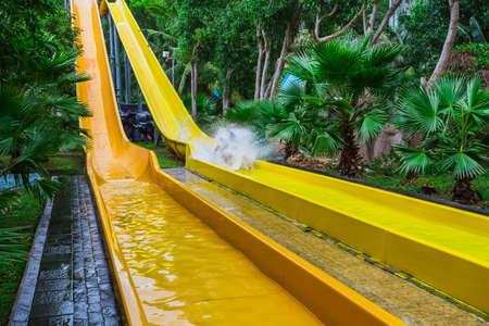 VINPEARL RESORT, NHA TRANG, VIETNAM - NOV 24, 2014. Colorful waterslide in Vinpearl water park, Nhatrang - Vietnamのeditorial素材