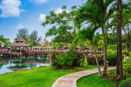 KOH CHANG, THAILAND - 31 MART, 2015: Klong Prao Resort. Cottages on the Bay in a tropical gardenのeditorial素材