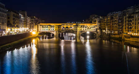 FLORENCE, ITALY - 23 JUNE, 2014: Night view of the river in Florence Italyのeditorial素材