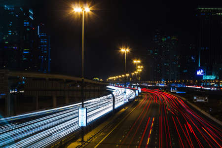 DUBAI, UAE - NOVEMBER 14: Nightlife in Dubai Marina. UAE. November 14, 2012. Dubai was the fastest developing city in the world between 2002 and 2008.のeditorial素材